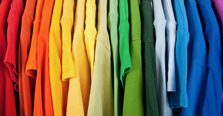 What is the difference between 100% cotton and 50/50 cotton/poly blend t-shirts and how do they affect screen printing?